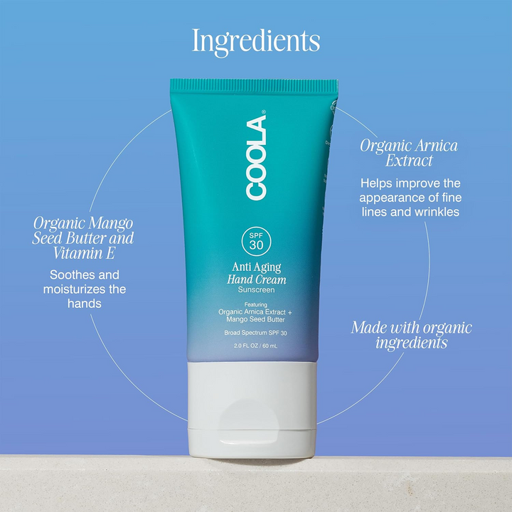 Coola anti-aging hand cream with ingredients listed on a blue background