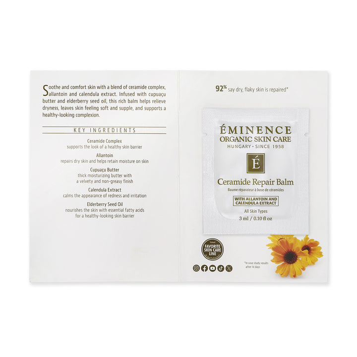 An open whitesample card set from Éminence Organic Skin Care showing the front and back of a Ceramide Repair Balm packet, with text describing ingredients and benefits, plus a yellow flower illustration on the right panel.