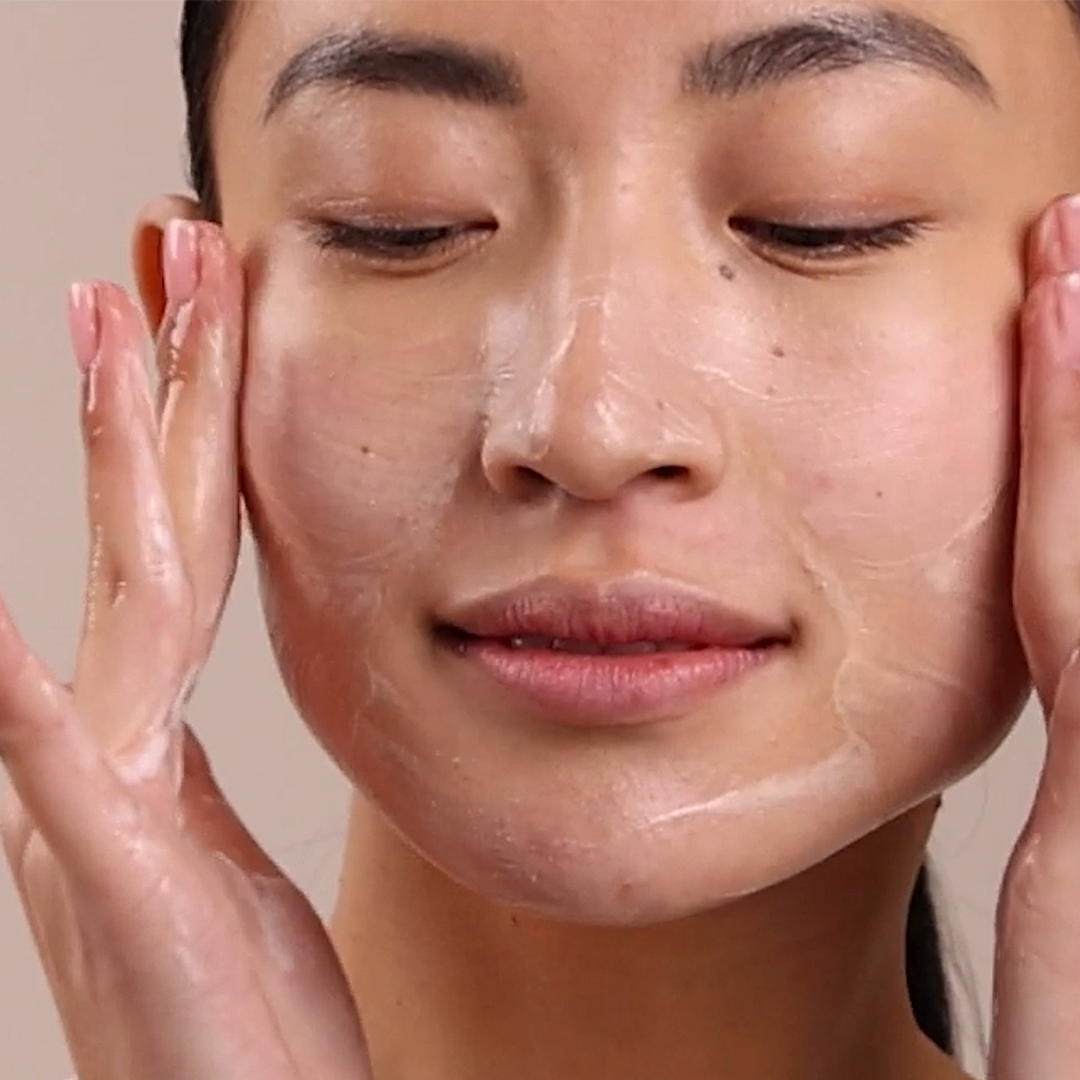 Eminence Organics Clear Skin Starter Set model using clear skin cleanser