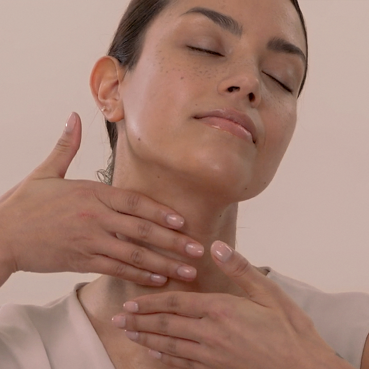 Eminence Organics Hibiscus Ultra Lift Neck Cream model applying on neck