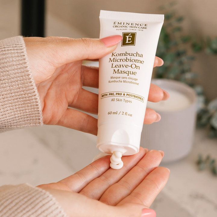 woman using Eminence Organics Kombucha Microbiome Leave-On Masque on her hand