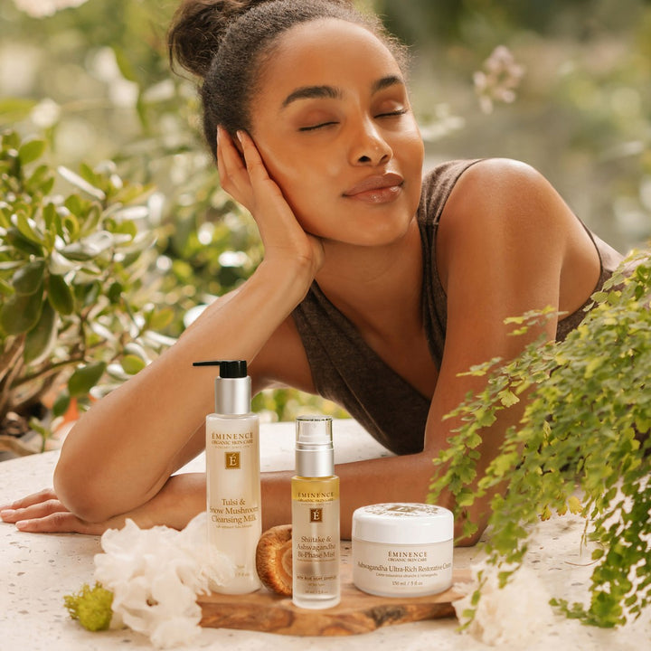 Eminence Organics Shiitake & Ashwagandha Bi-Phase Mist lifestyle shot with complete collection