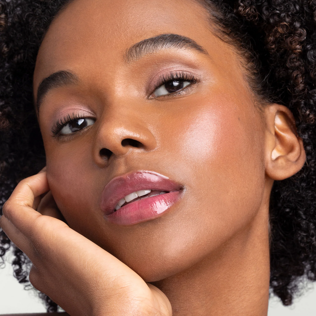 Woman wearing Jane Iredale Just Kissed pH Lip Oil on her lips