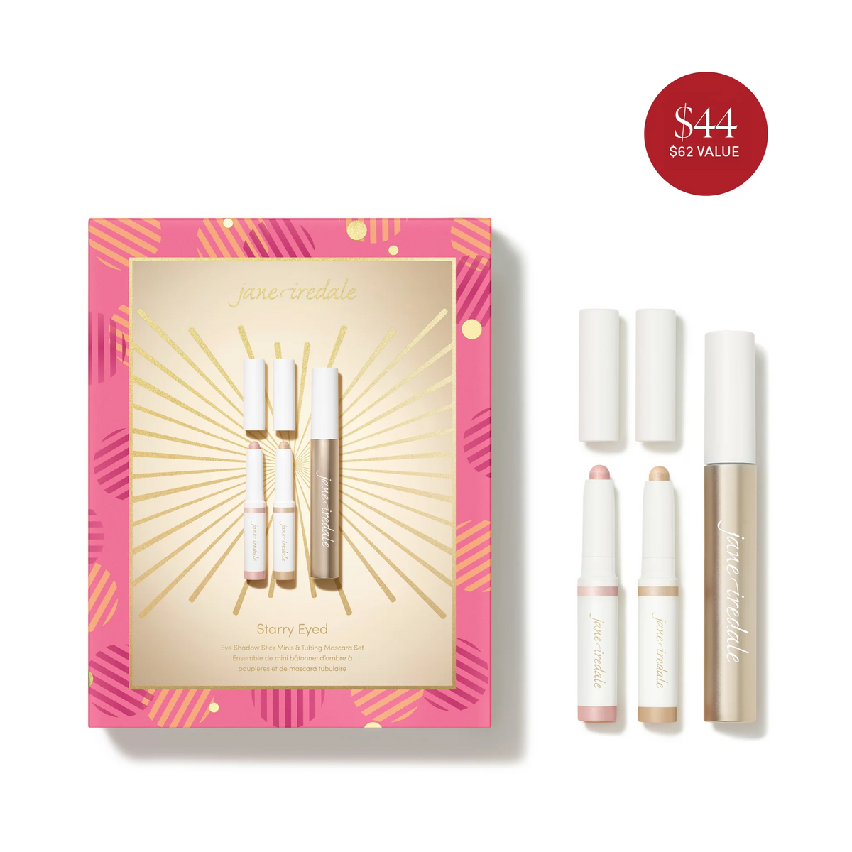 Jane Iredale Starry Eyed set with two mini eye shadow sticks and tubing mascara beside pink and gold gift packaging.
