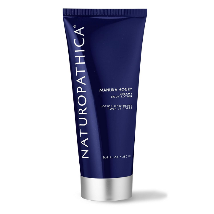 Naturopathica Manuka Honey Creamy Body Lotion tube on a white background