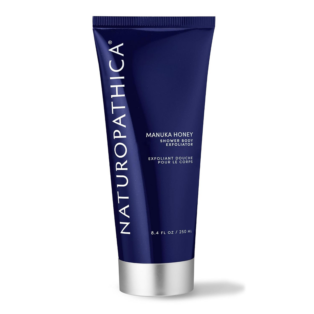 Naturopathica Manuka Honey Shower Body Exfoliator tube on a white background