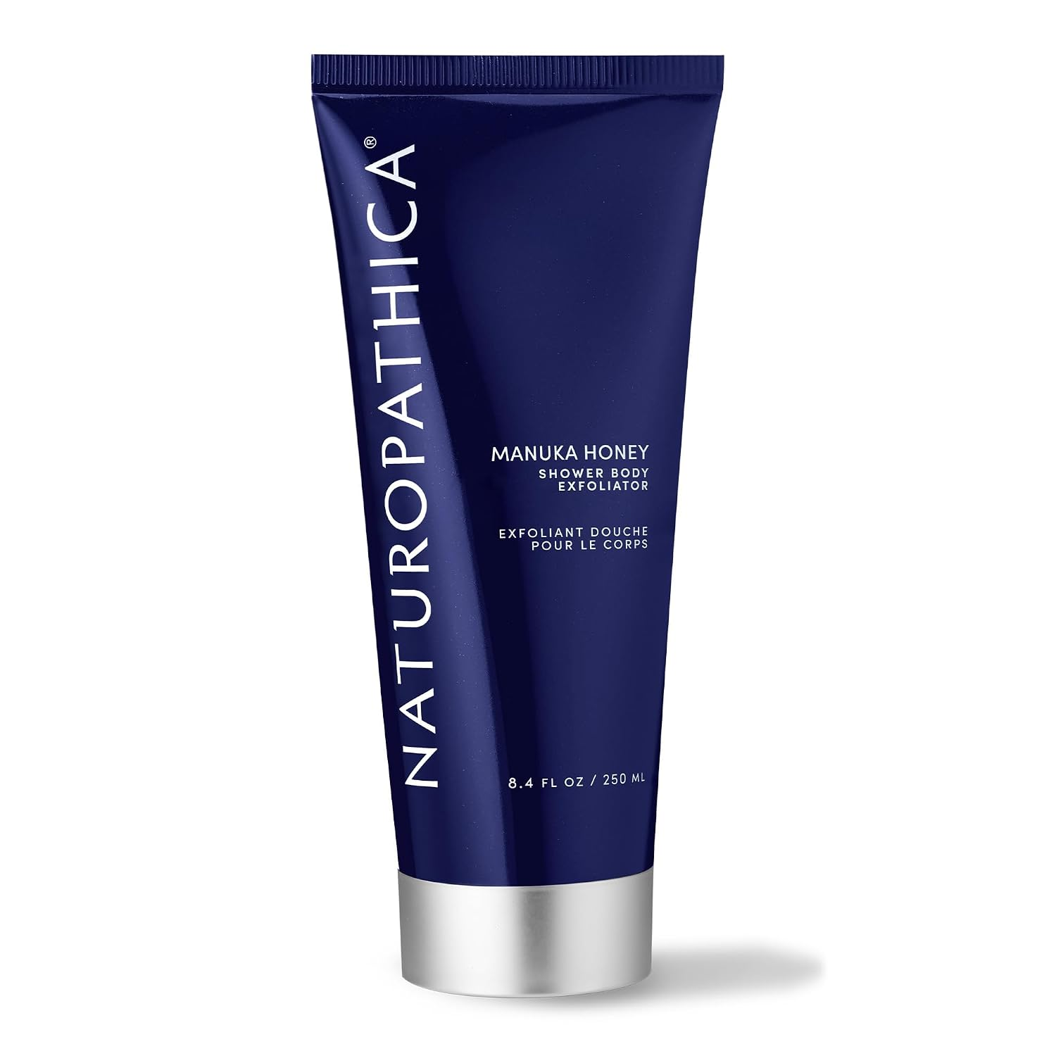 Naturopathica Manuka Honey Shower Body Exfoliator tube on a white background