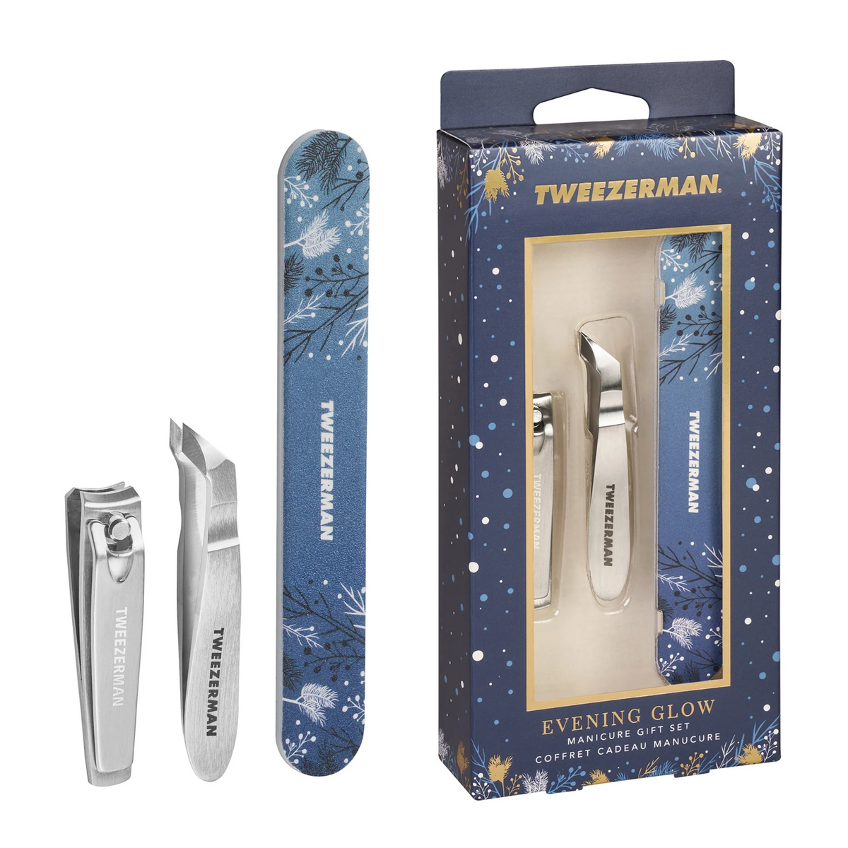 Tweezerman Evening Glow Manicure Gift Set with silver nail clipper, cuticle nipper and blue botanical nail file beside gift box.

