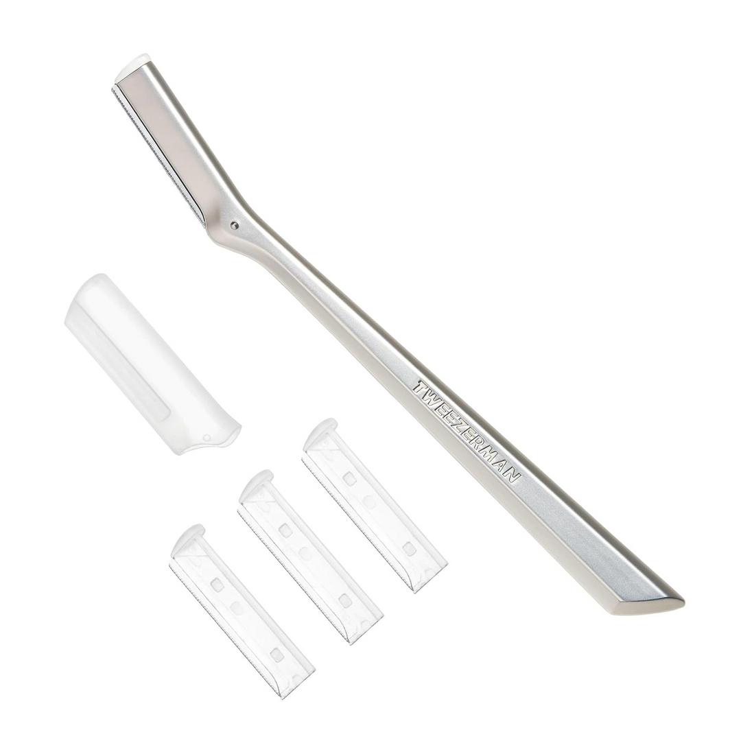 Tweezerman Facial Razor on a white background with replacement blades