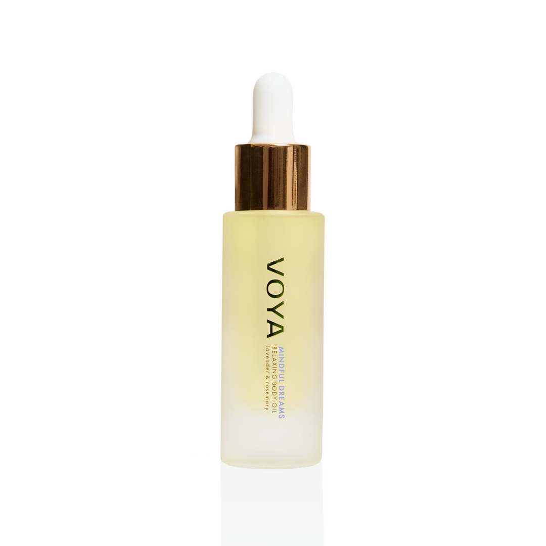 VOYA Mindful Dreams: Relaxing Body Oil mini bottle with a white dropper cap and metallic gold collar, on a clean white background.