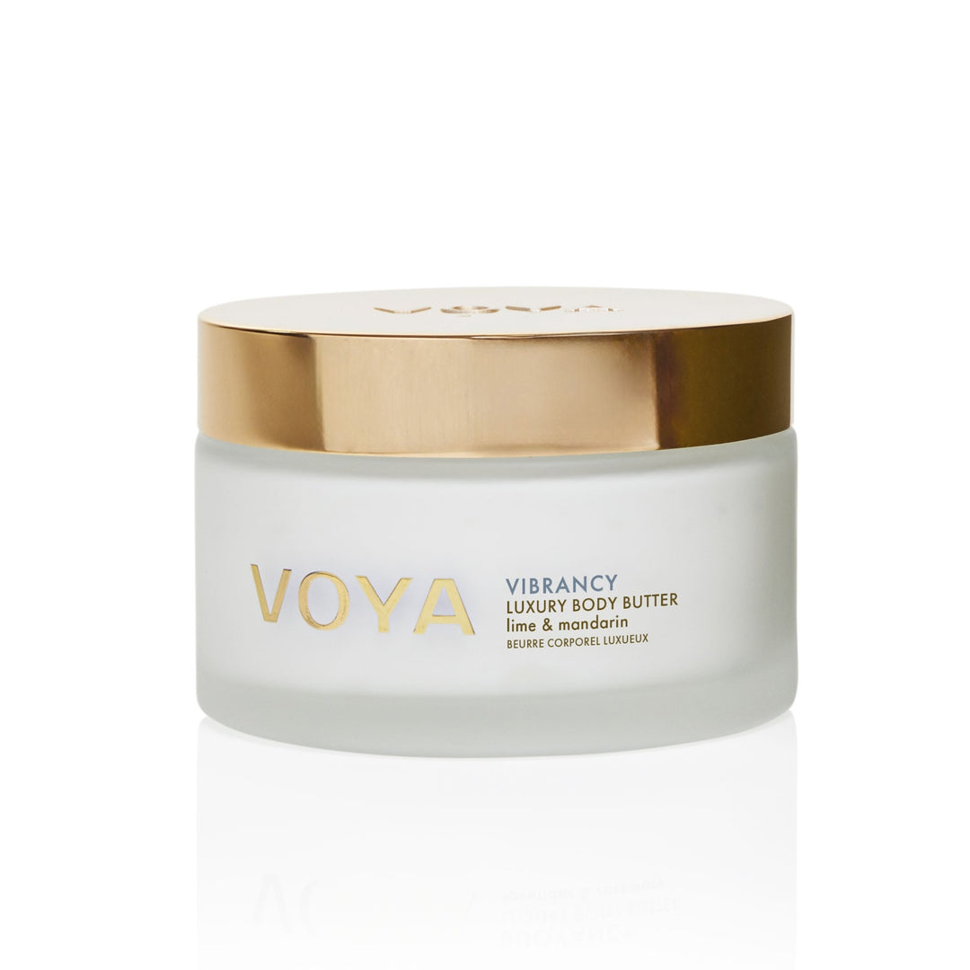 VOYA Vibrancy Luxury Body Butter in a frosted jar with a gold lid, lime and mandarin scent.
