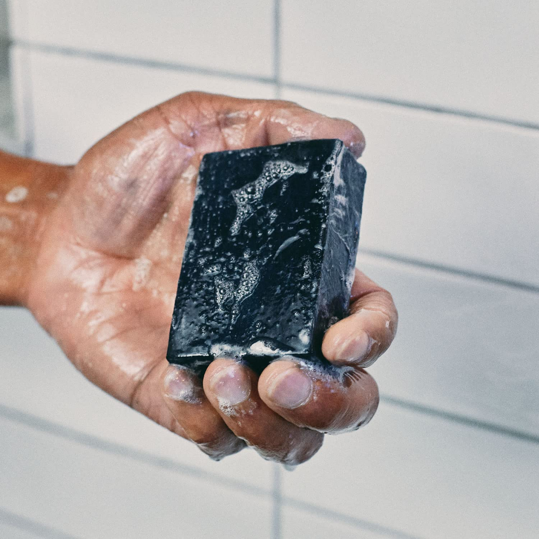 https://naturalbeautygroup.com/cdn/shop/products/brickell-mens-products-purifying-charcoal-soap-bar.png?v=1678142896&width=1080